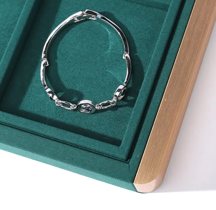 Green texture jewelry display — reference photograph 5
