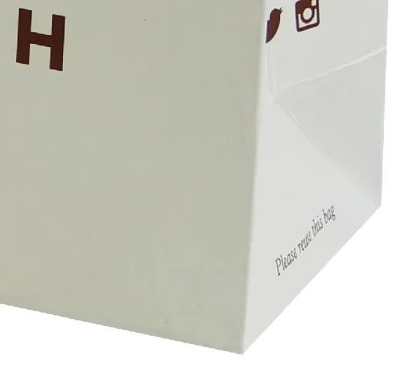 Handle and printed detail of a jewelry shopping bag